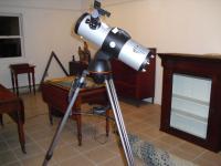 Nexstar Celestron Telescope on tripod.